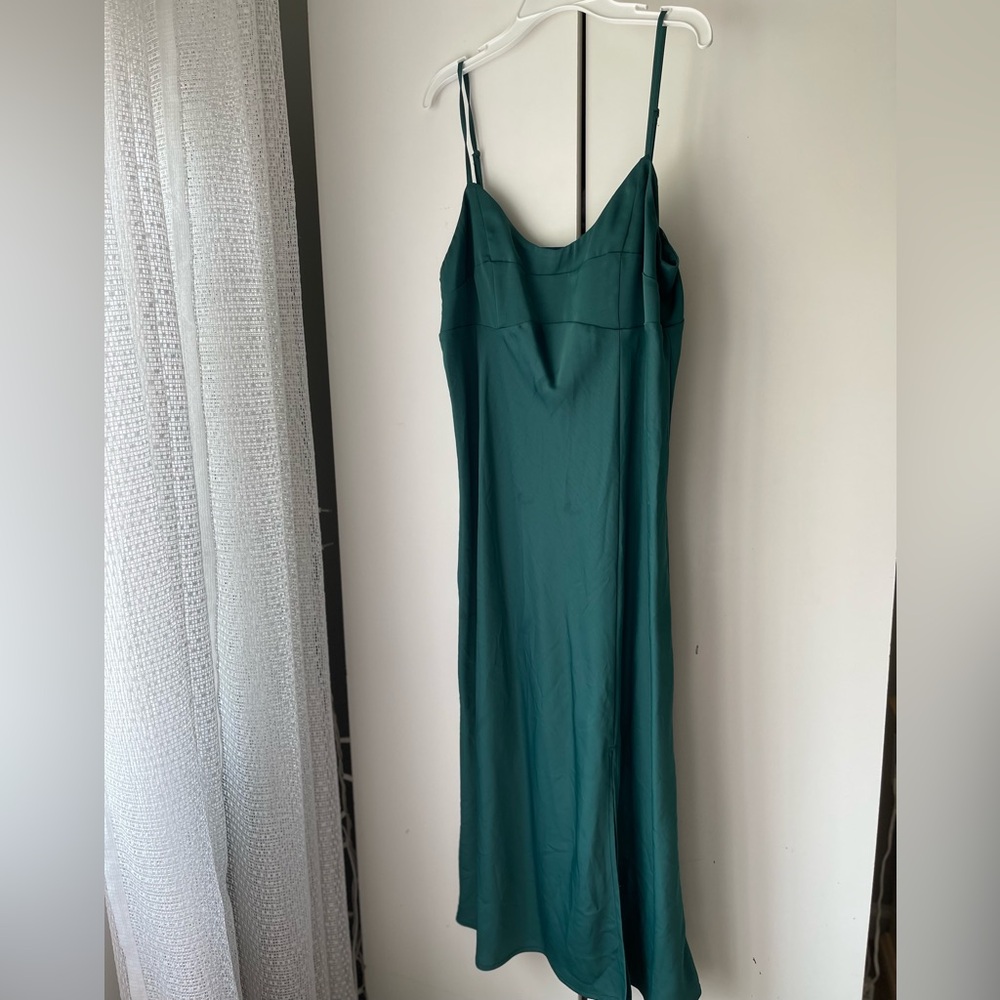 Green formal dress perfect for a wedding guest